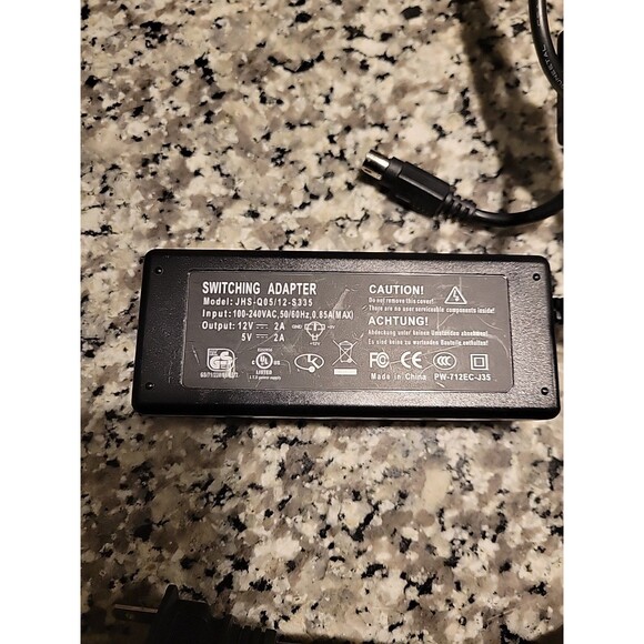 Switching Power Adapter JHS-Q05/12-S335, PW-712EC-J35 Output: 12v 2a/5v 2a - Picture 3 of 3